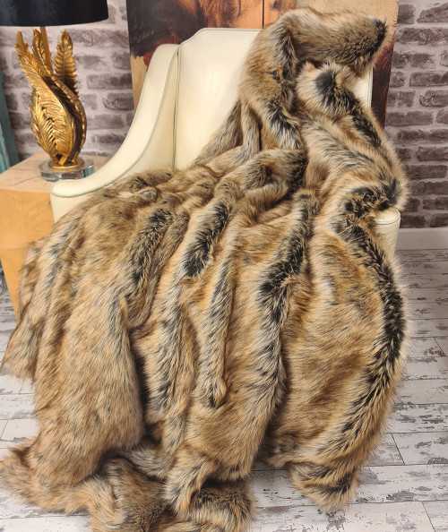 Luxury long-haired beige and brown faux fur blanket