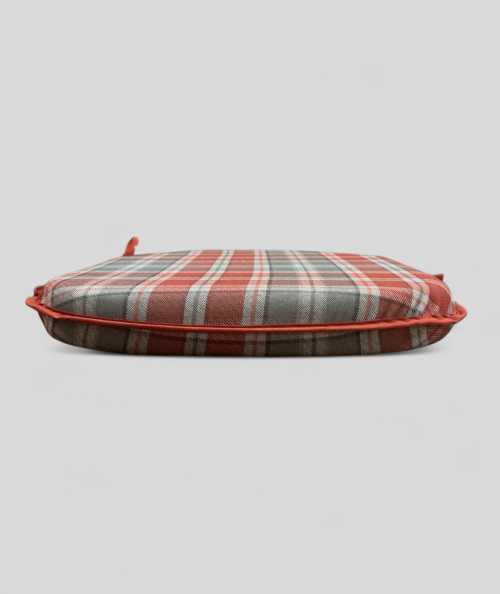 Spindle shaped chair cushions in rust red and light grey