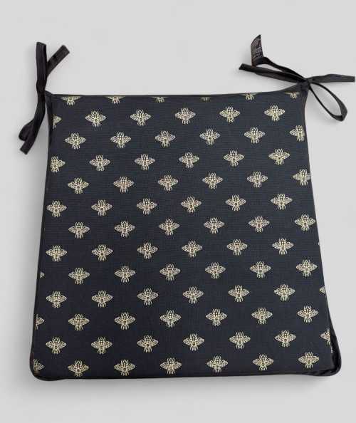 Black tapered seat pads with an all over small gold bee print